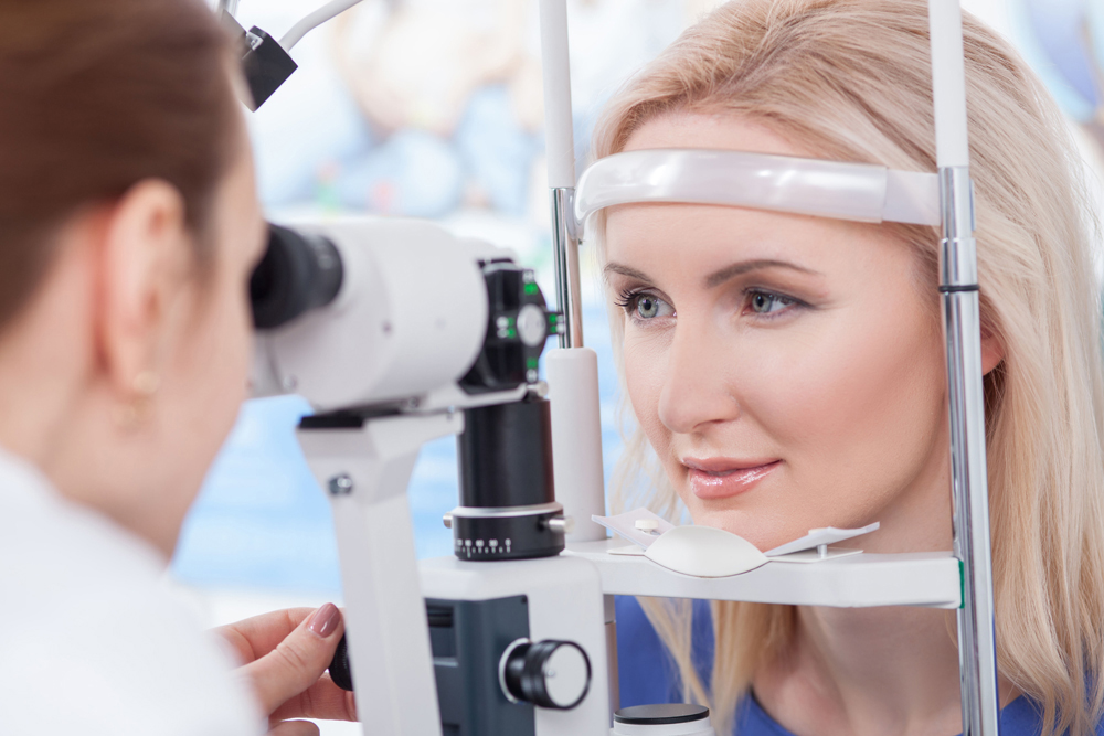 Woman getting a Lasik eye exam.